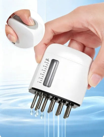 Stranda applicator dispensing oil through its comb teeth